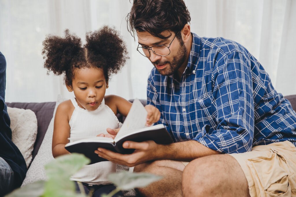Family working in an activity book.