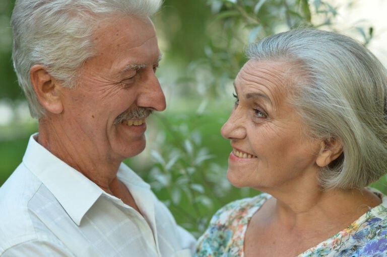 Happy, Healthy Senior Couple looking at each other
