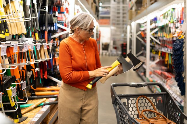 Woman Buying Supplies in Home Improvement Store
