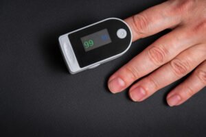 Oximeter test for Oxygen on a finger.